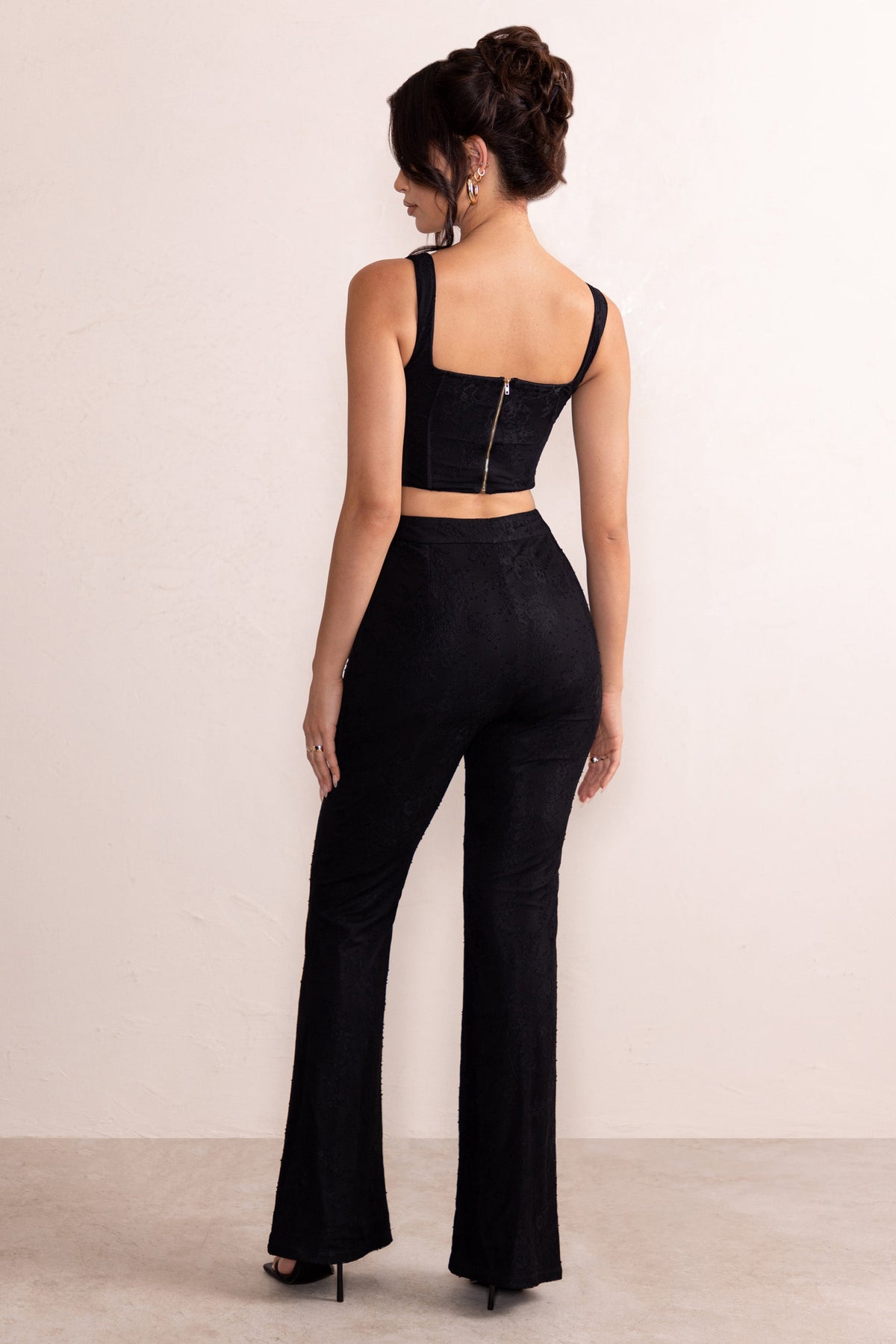 https://www.clubllondon.ie/cdn/shop/products/CL128055-AdaBlackLaceOverlayFlaredTrousers2_1200x.jpg?v=1666882800